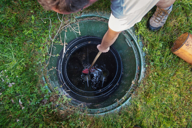 Emptying household septic tank. Cleaning sludge from septic syst cleaning sludge from septic system